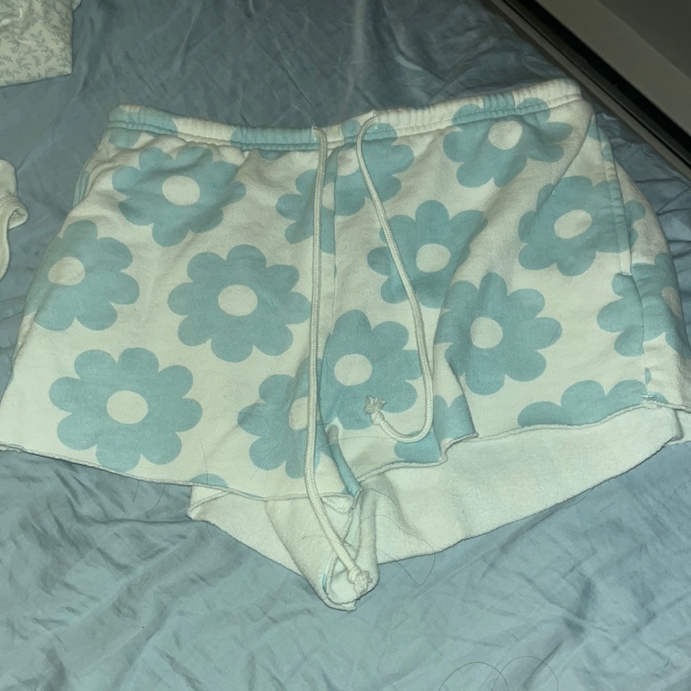 White shorts with blue flowers.